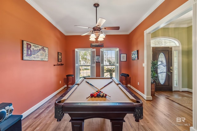 playroom featuring crown molding, billiards, wood finished floors, and baseboards