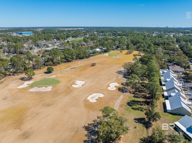 birds eye view of property with golf course view