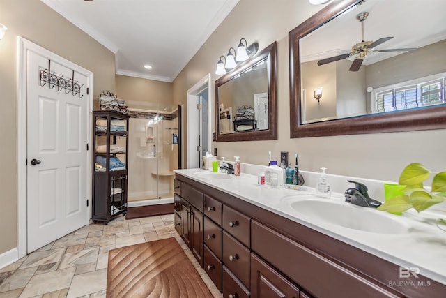 full bath with double vanity, a shower stall, ornamental molding, and a sink