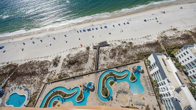 aerial view with a beach view and a water view