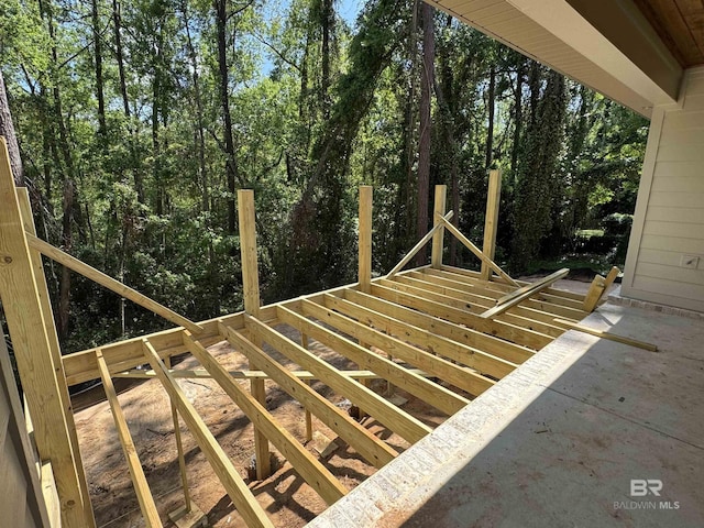 wooden deck featuring stairs