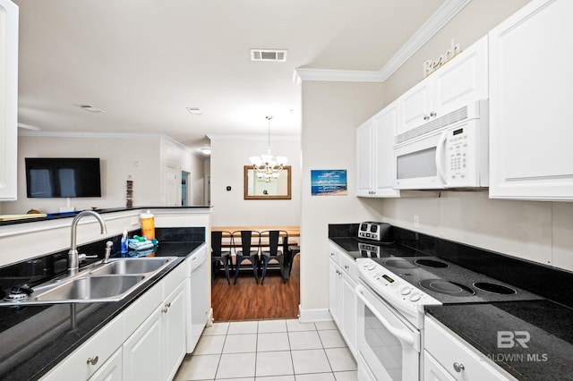 kitchen with white appliances, crown molding, white cabinetry, light tile patterned flooring, and sink