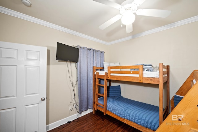 bedroom with ceiling fan, ornamental molding, and dark hardwood / wood-style floors