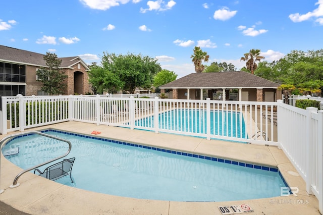 view of pool featuring a patio