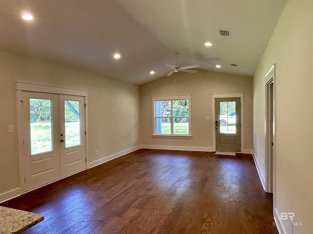 entryway with visible vents, vaulted ceiling, dark wood-style flooring, and french doors