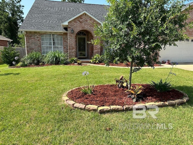 ranch-style house with a front lawn and a garage