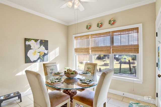 dining room featuring ceiling fan, crown molding, and light tile patterned floors