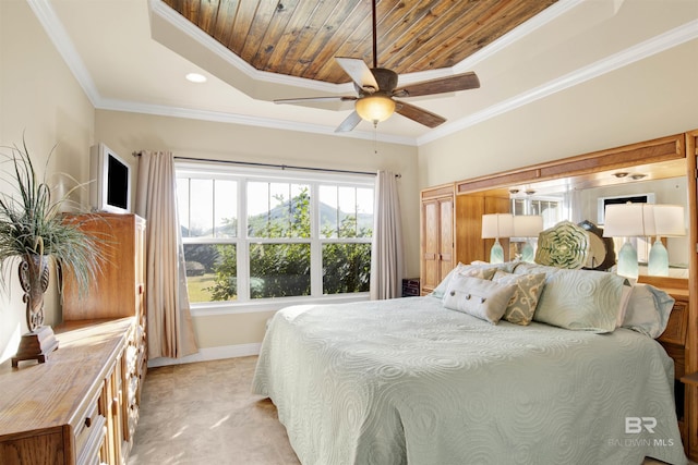 bedroom with a raised ceiling, crown molding, ceiling fan, and wooden ceiling