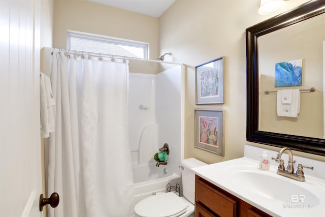 full bathroom with shower / tub combo, vanity, and toilet