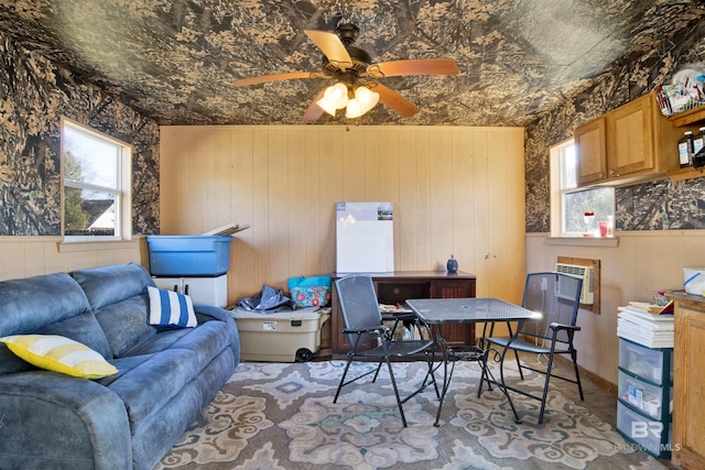 office area with a wall unit AC and wooden walls