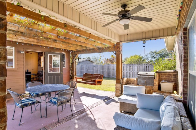 view of patio / terrace with outdoor lounge area, grilling area, and ceiling fan