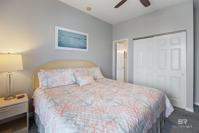 carpeted bedroom with ceiling fan and a closet