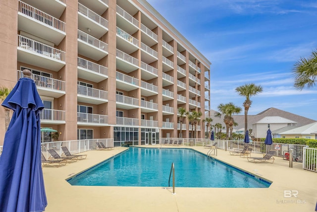 view of pool featuring a patio