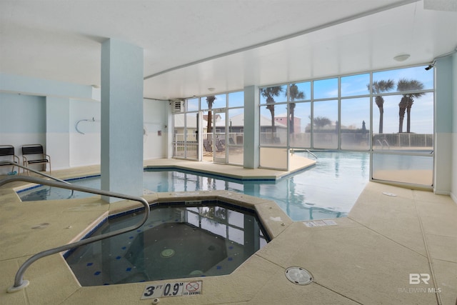 view of pool featuring an indoor hot tub