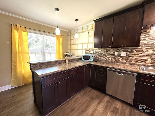 kitchen featuring dark wood finished floors, stainless steel dishwasher, a peninsula, and backsplash