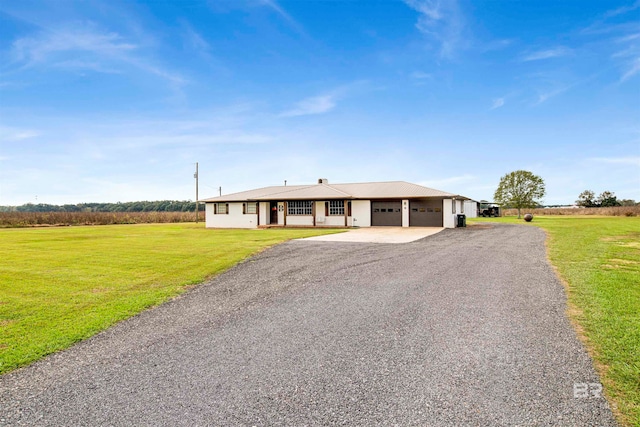 ranch-style home featuring a front yard