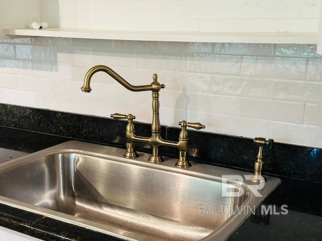 interior details with sink and backsplash