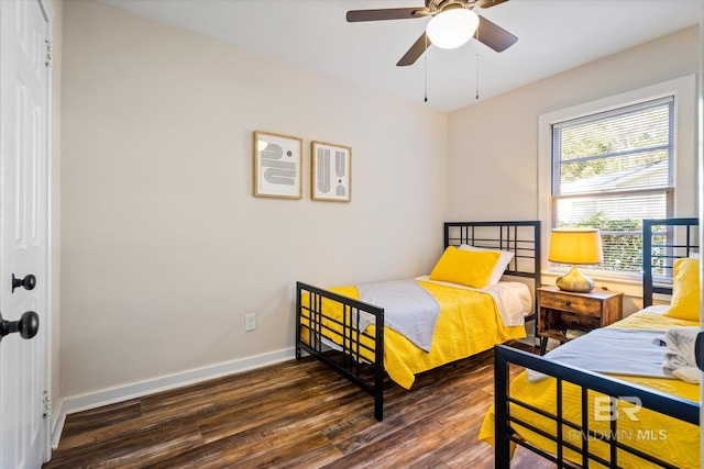 54 S Bishop Ln, Mobile, AL 36608 - bedroom with wood finished floors, baseboards, a closet, and ceiling fan