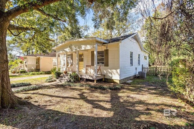 54 S Bishop Ln, Mobile, AL 36608 - view of front facade featuring covered porch and cooling unit