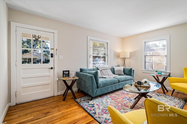 54 S Bishop Ln, Mobile, AL 36608 - living room with plenty of natural light, light wood-type flooring, and baseboards