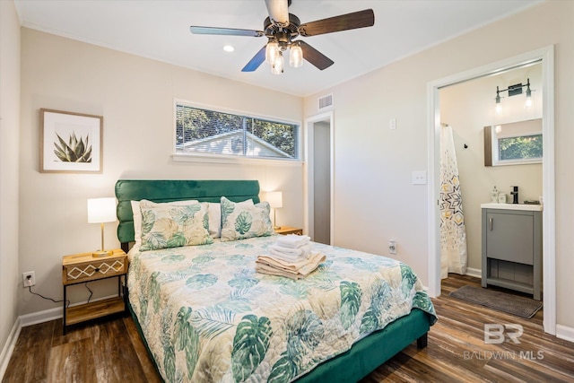 54 S Bishop Ln, Mobile, AL 36608 - bedroom with wood finished floors, baseboards, ceiling fan, recessed lighting, and connected bathroom