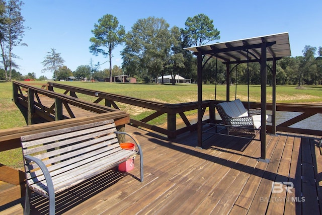 deck featuring a yard