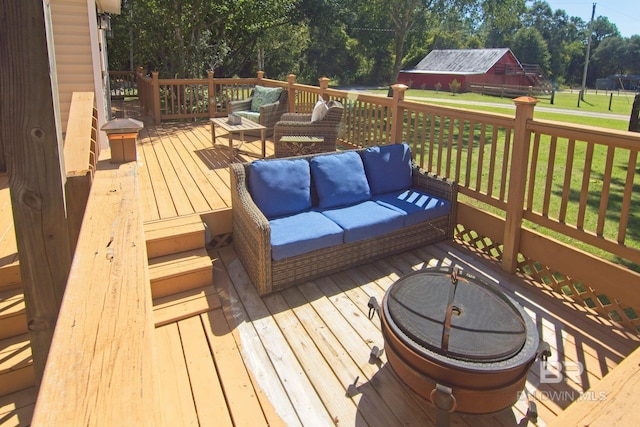 wooden deck with a yard