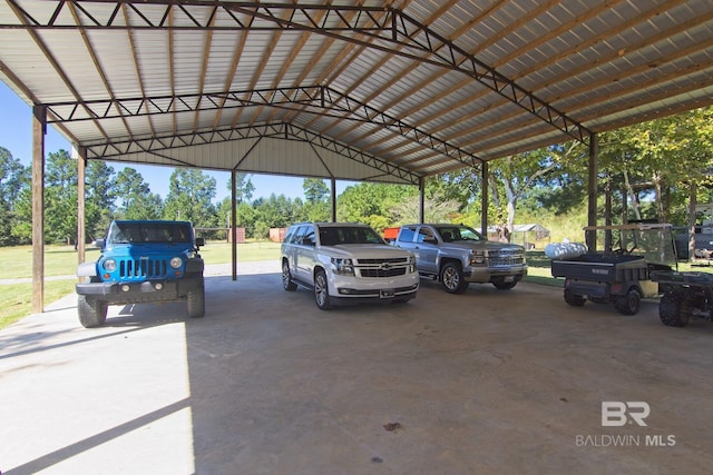 view of vehicle parking featuring a carport