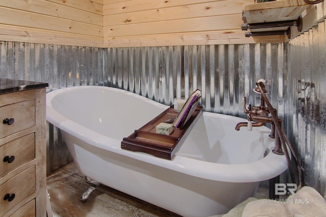 bathroom with wooden walls and a washtub