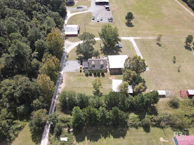 birds eye view of property with a rural view