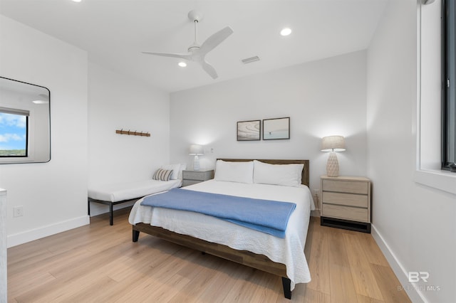 bedroom with light wood-type flooring, recessed lighting, baseboards, ceiling fan, and visible vents