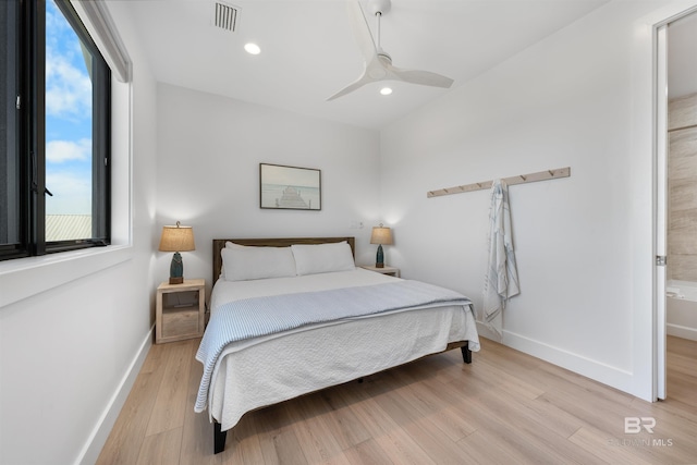 bedroom featuring light wood-style flooring, visible vents, baseboards, recessed lighting, and a ceiling fan