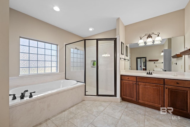 bathroom featuring lofted ceiling, a shower stall, vanity, tile patterned flooring, and a bath