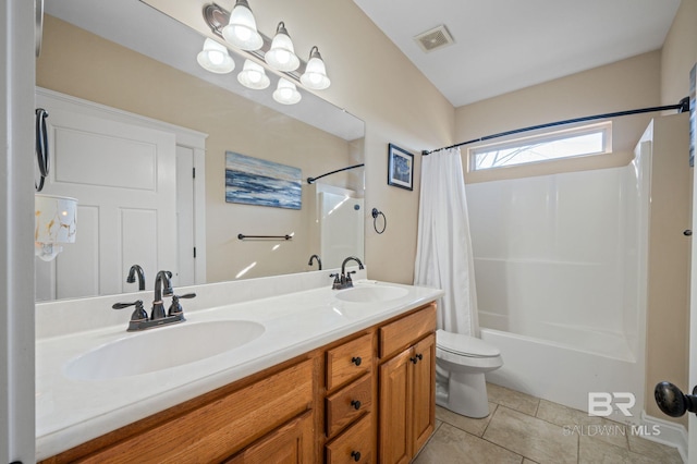 full bath with shower / tub combo with curtain, visible vents, a sink, and tile patterned floors