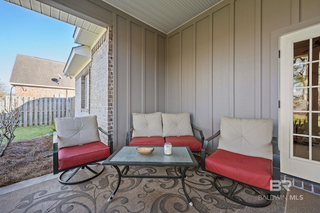 view of patio / terrace featuring fence