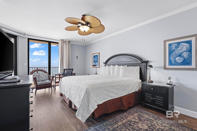 bedroom with crown molding, dark wood-type flooring, and ceiling fan