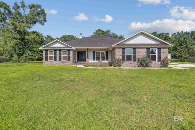 5029 Settle Rd, Molino, FL 32577 - ranch-style home with a front yard