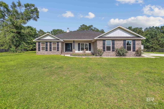 ranch-style home with a front yard