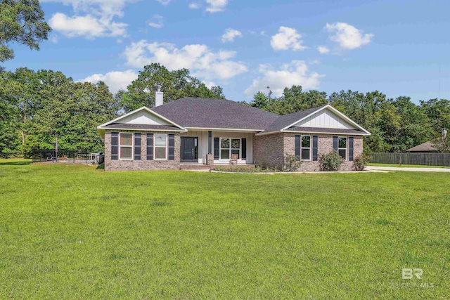 ranch-style home with a front yard