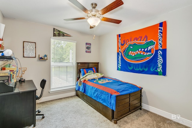 carpeted bedroom featuring ceiling fan