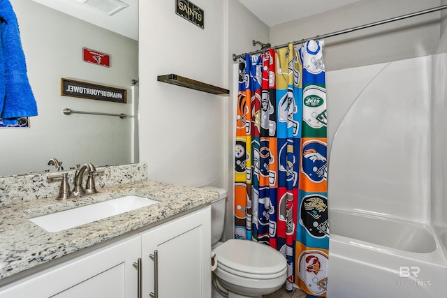 full bathroom with toilet, shower / bath combo, and vanity