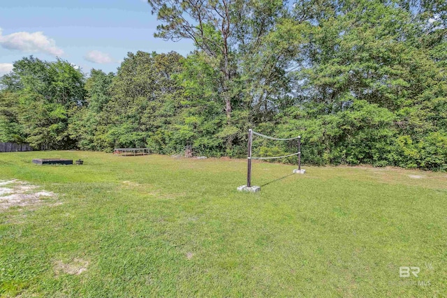 view of yard with volleyball court