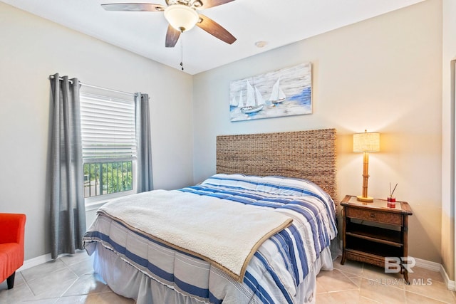 bedroom with ceiling fan and light tile patterned flooring