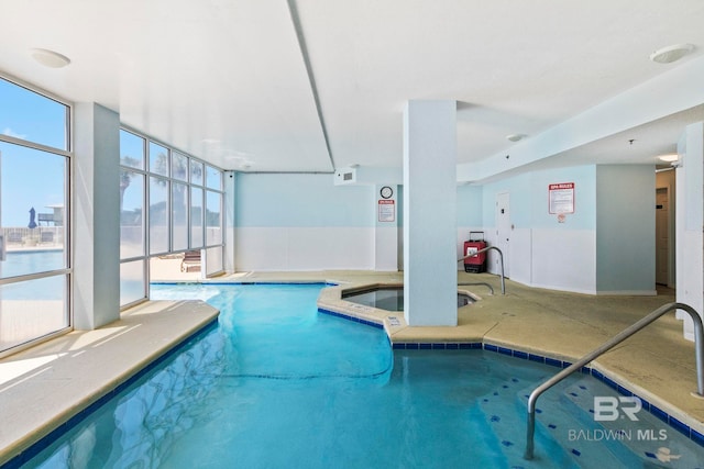 view of pool featuring an indoor hot tub