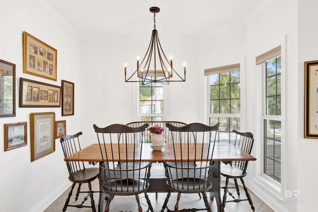 tiled dining area featuring ornamental molding