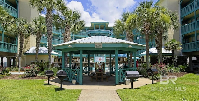 surrounding community featuring a gazebo and a yard