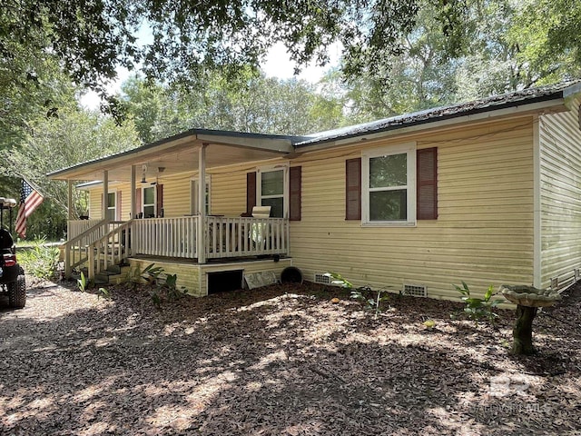 25850 Patterson Rd, Robertsdale, AL 36567 - view of front of house featuring a porch