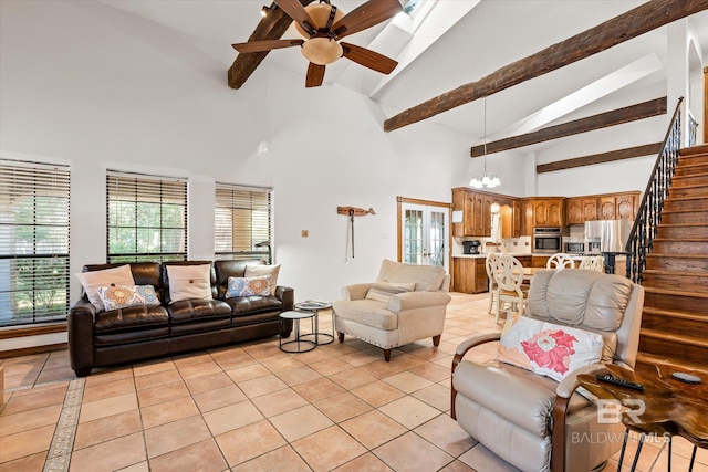 tiled living room featuring ceiling fan with notable chandelier, beamed ceiling, and high vaulted ceiling