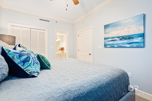 carpeted bedroom featuring ornamental molding, a closet, and ceiling fan