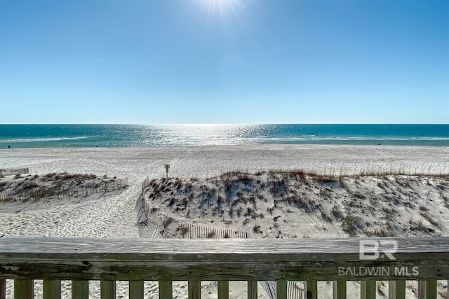 view of water feature with a beach view